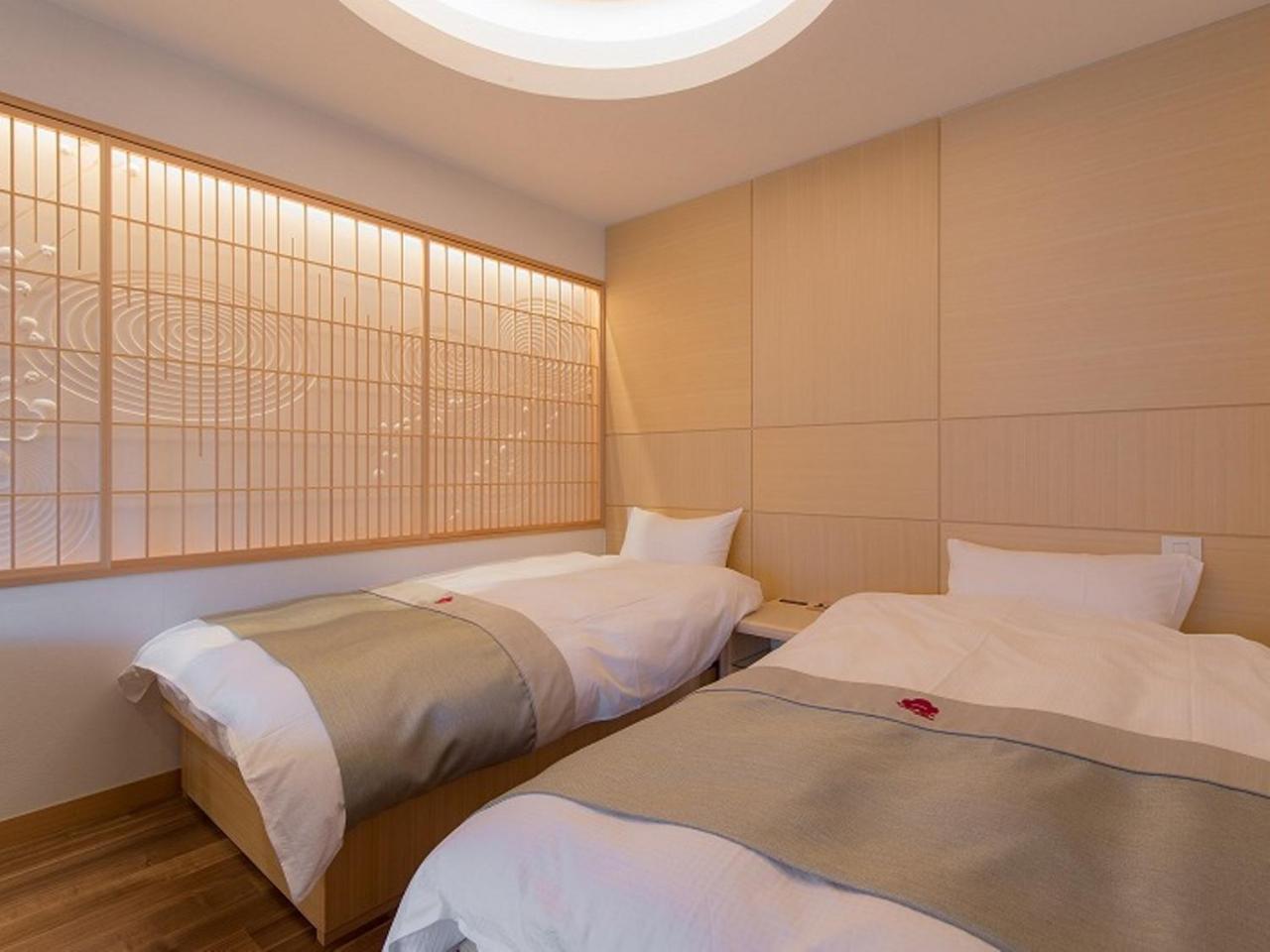 Hotel Okuhita Onsen Umehibiki Extérieur photo