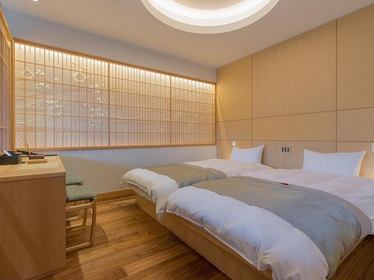 Hotel Okuhita Onsen Umehibiki Extérieur photo