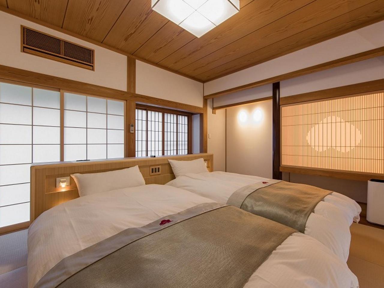 Hotel Okuhita Onsen Umehibiki Extérieur photo